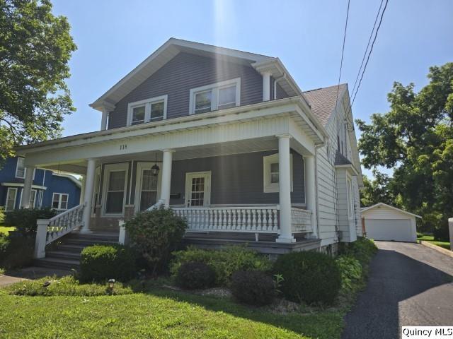 118 South Fayette Street Carthage, IL 62321 - Photo 29 of 32 a front view of a house with a yard