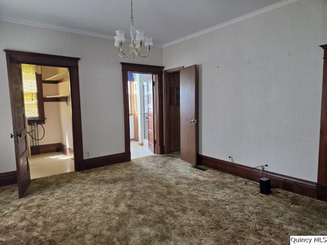 118 South Fayette Street Carthage, IL 62321 - Photo 7 of 32 an empty room with chandelier