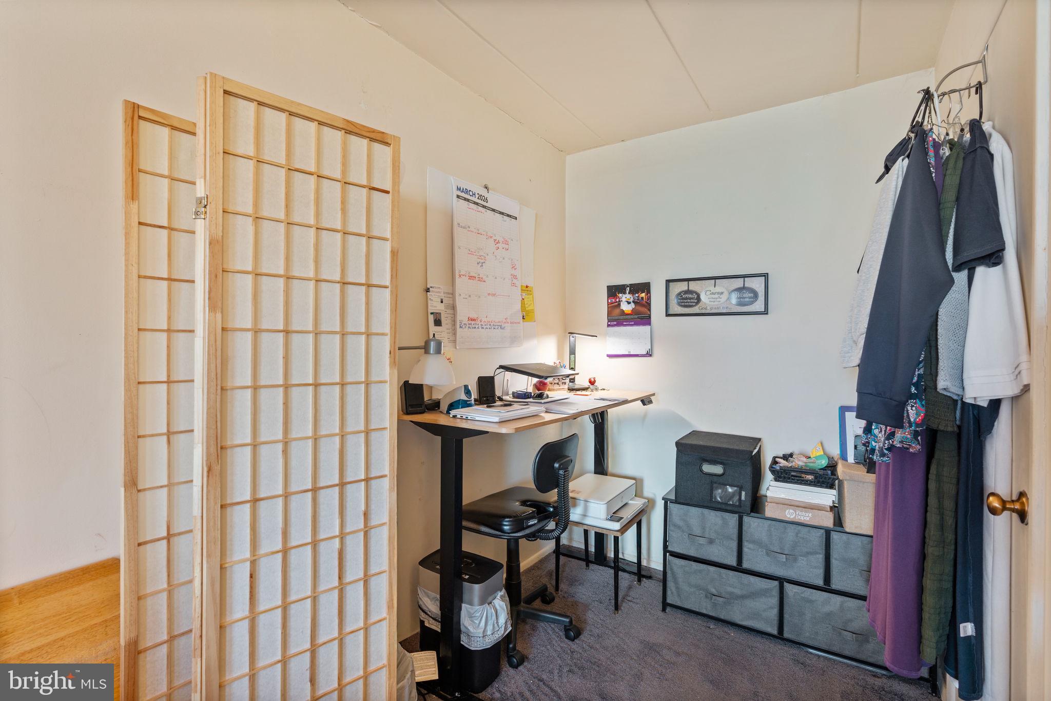 5382 Smooth Meadow Way, Unit 4 Columbia, MD 21044 - Photo 16 of 23 a view of a workspace with furniture and a window