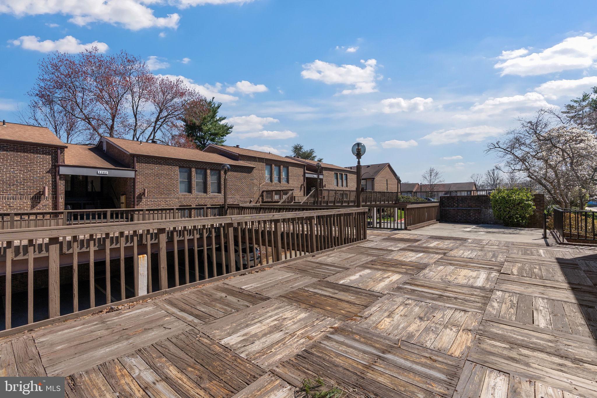 5382 Smooth Meadow Way, Unit 4 Columbia, MD 21044 - Photo 21 of 23 a view of a house with a roof deck