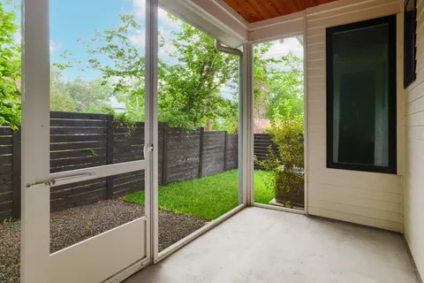 a view of a porch with a yard