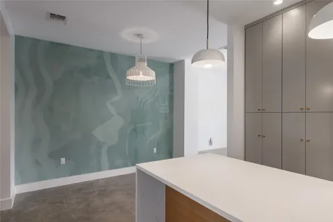 a room that has a bath tub and a sink