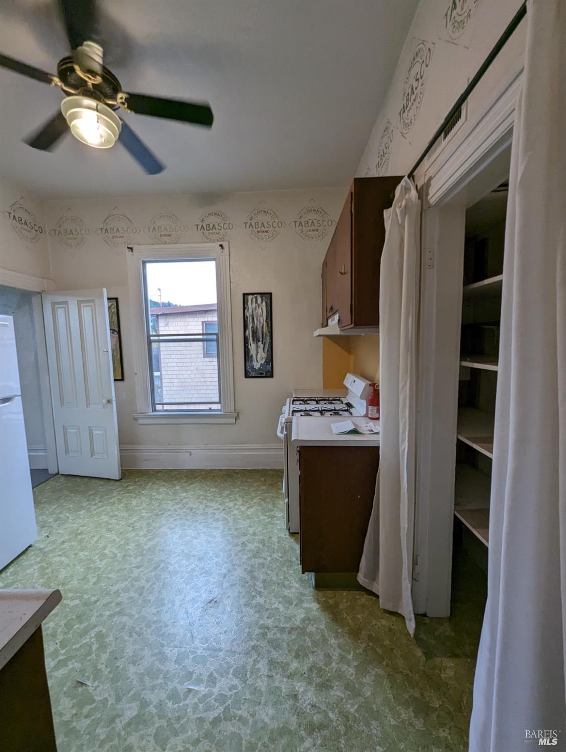 1547 4th Street, Unit A San Rafael, CA 94901 - Photo 46 of 64 a view of room with window and ceiling fan