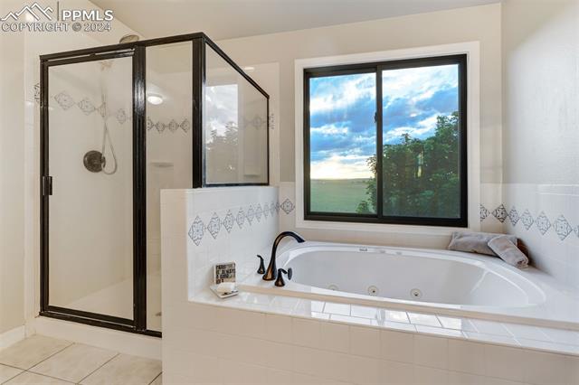 20880 Scott Road Peyton, CO 80831 - Photo 21 of 49 Owners soaking tub with spectacular views