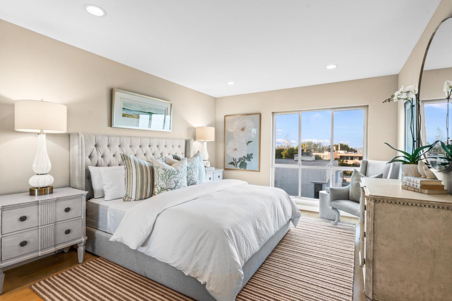30 Mounds Road, Unit 305 San Mateo, CA 94402 - Photo 17 of 28 a bedroom with a large bed and a view of kitchen