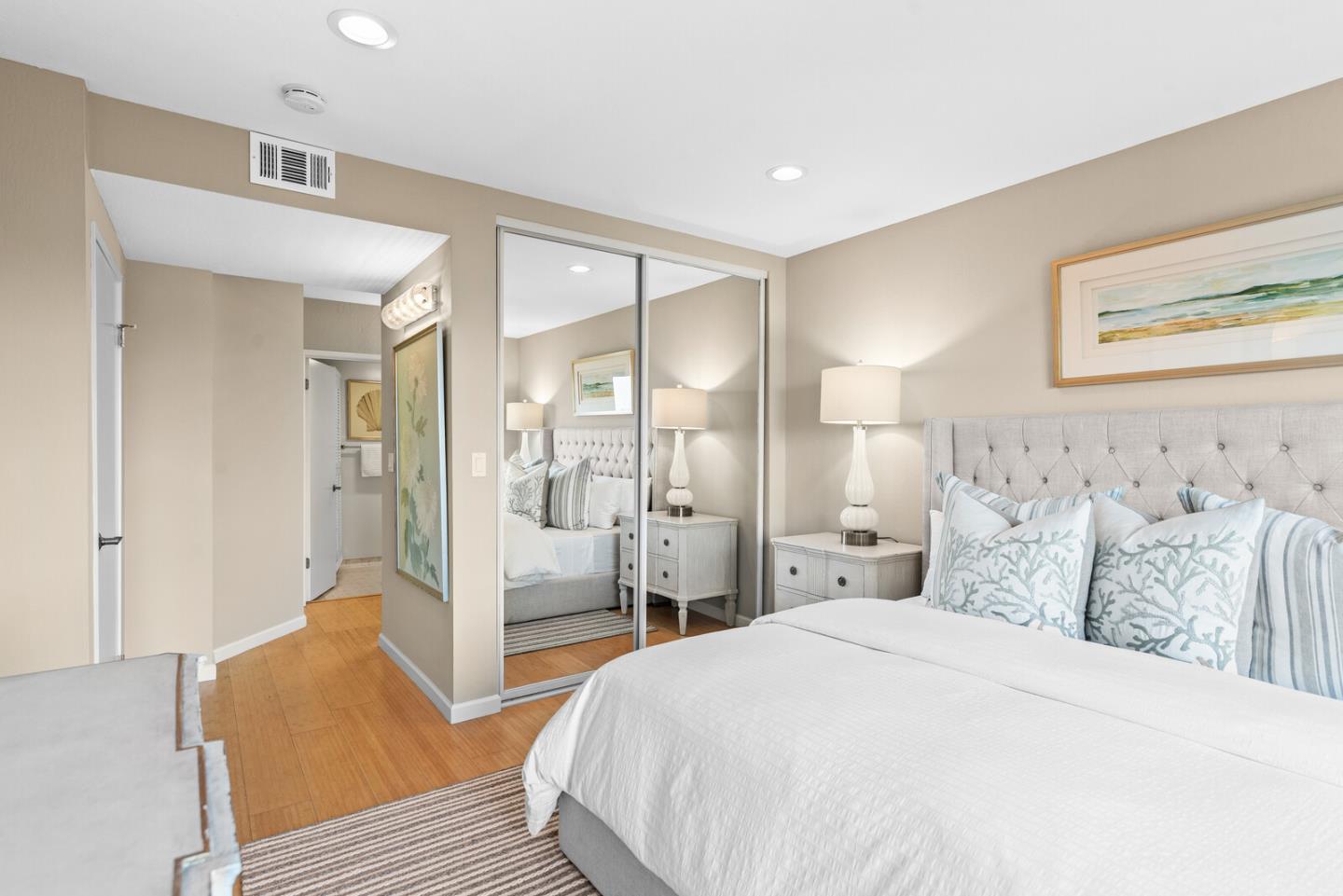 30 Mounds Road, Unit 305 San Mateo, CA 94402 - Photo 18 of 28 a spacious bedroom with a bed and a dresser