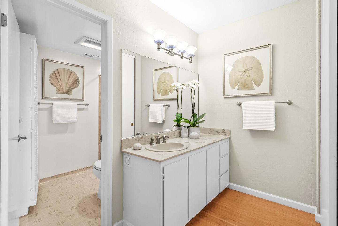 30 Mounds Road, Unit 305 San Mateo, CA 94402 - Photo 19 of 28 a bathroom with a sink vanity and mirror