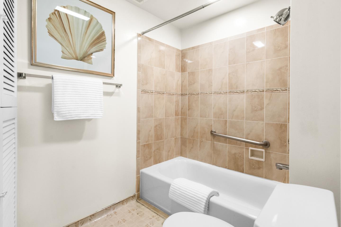 30 Mounds Road, Unit 305 San Mateo, CA 94402 - Photo 20 of 28 a bathroom with a sink and a shower
