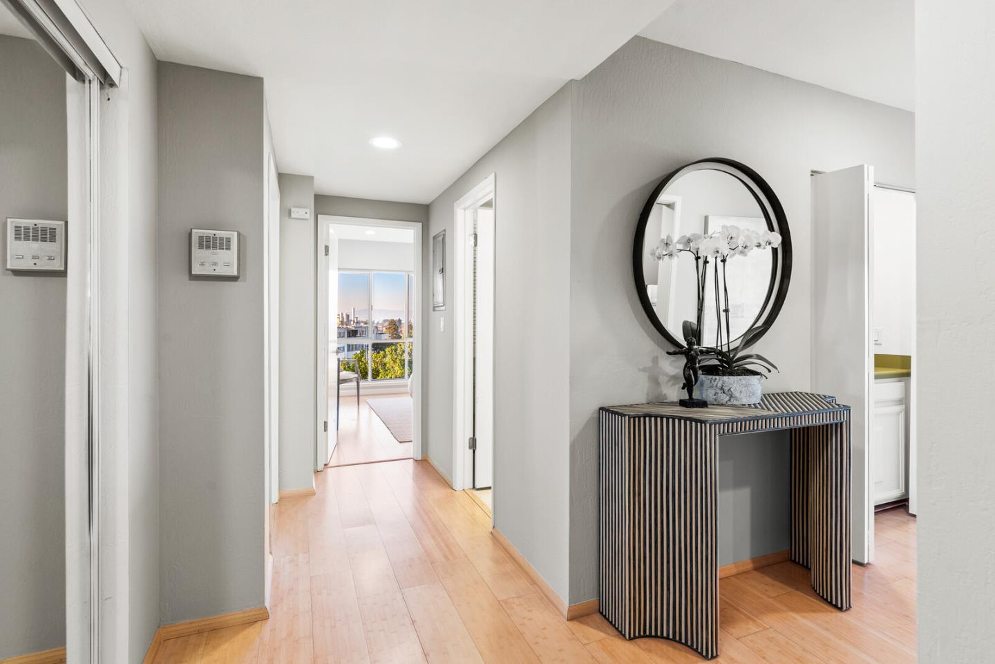 30 Mounds Road, Unit 305 San Mateo, CA 94402 - Photo 2 of 28 a view of a hallway with wooden floor