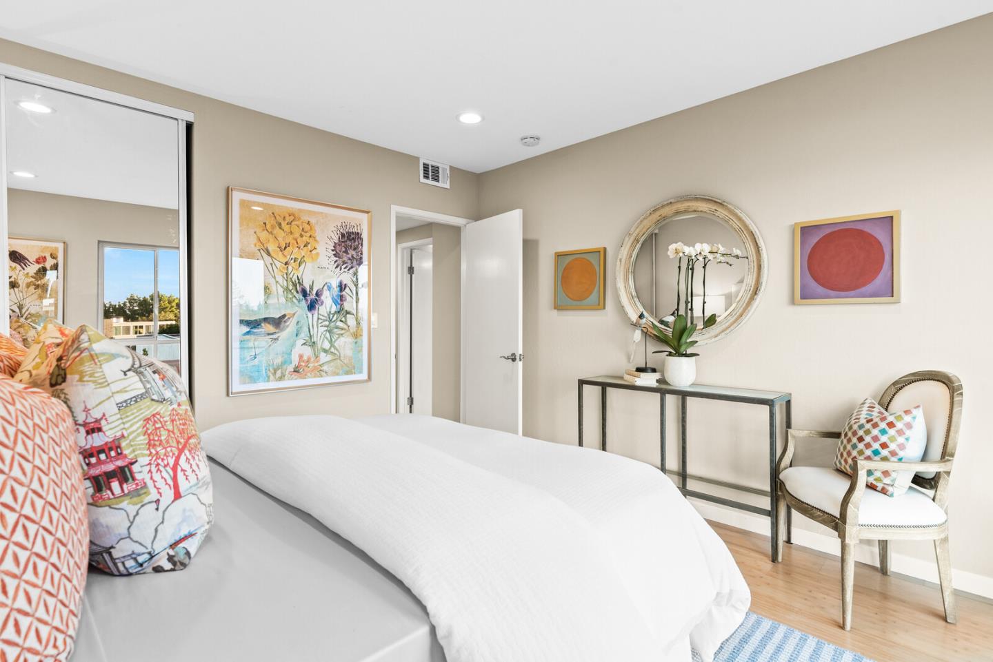 30 Mounds Road, Unit 305 San Mateo, CA 94402 - Photo 22 of 28 a bedroom with a bed and a painting on the wall