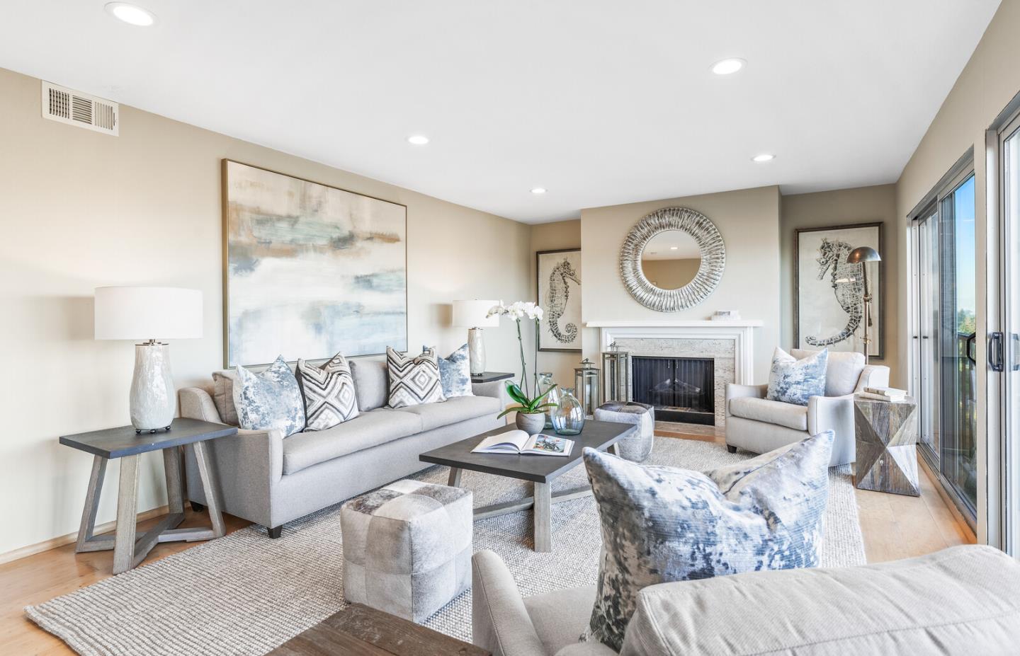 30 Mounds Road, Unit 305 San Mateo, CA 94402 - Photo 5 of 28 a living room with furniture a fireplace and a large mirror