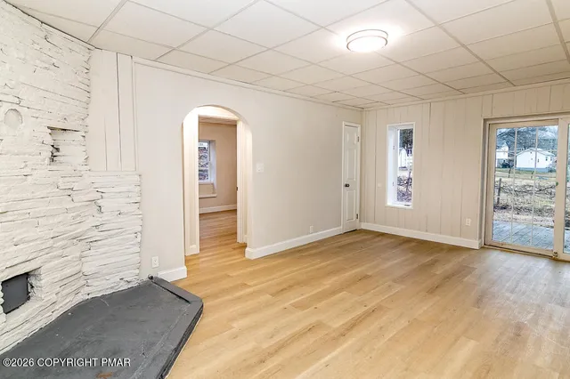 an empty room with windows