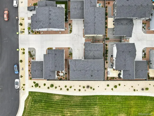 aerial view of building with yard