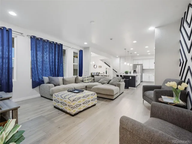 a living room with furniture and a couch