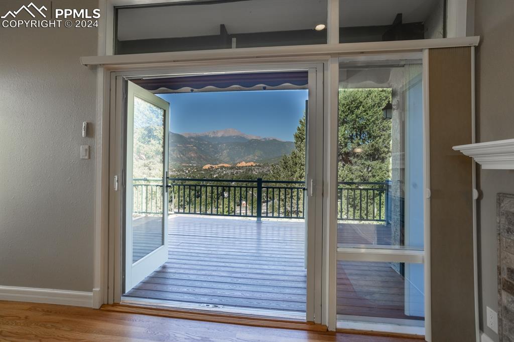 1074 Fontmore Road, Unit C Colorado Springs, CO 80904 - Photo 22 of 30 Living room walk out to deck with perfect view of Pikes Peak