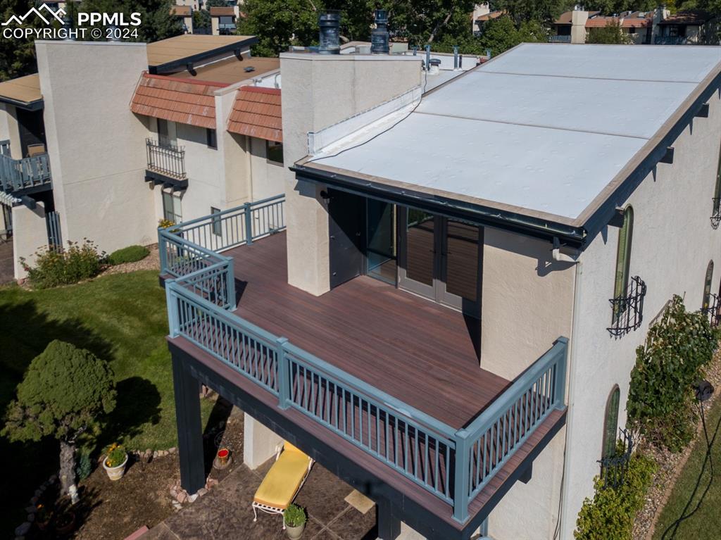 1074 Fontmore Road, Unit C Colorado Springs, CO 80904 - Photo 4 of 30 Aerial view of composite wrap-around deck with metal railings