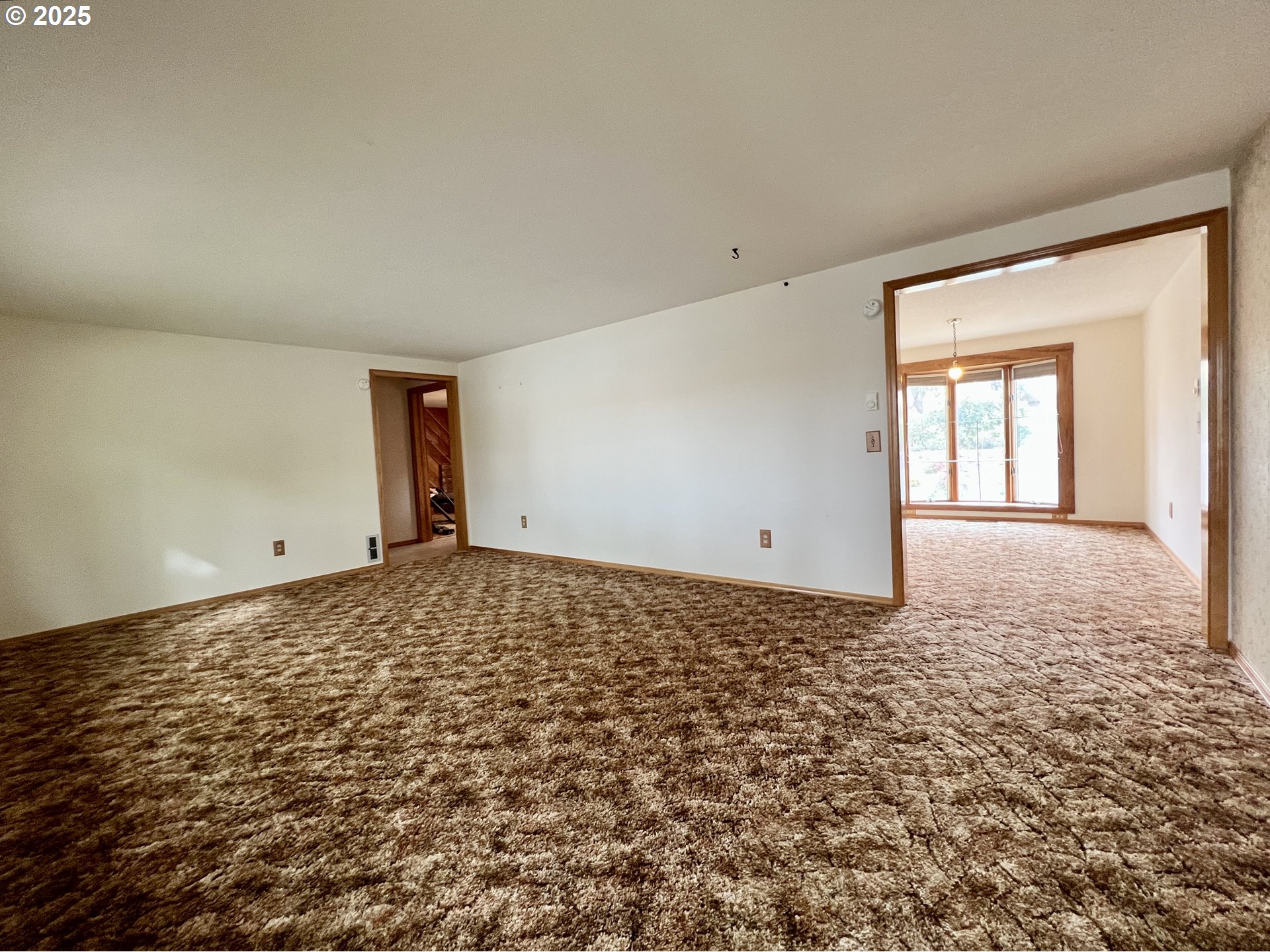 185 Rock Street Heppner, OR 97836 - Photo 10 of 25 an empty room with a natural light