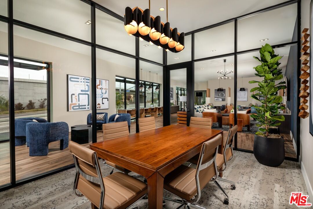 201 North La Brea Avenue, Unit 403 Inglewood, CA 90301 - Photo 6 of 19 a dining room with furniture window and wooden floor