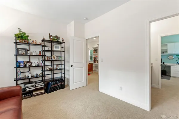 a view of empty room with shelves