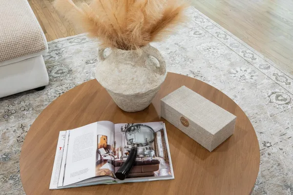 a picture of a living room with furniture