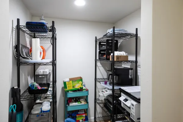 a room with storage and utility