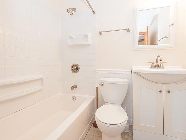 16 Tuckernuck Road Centerville, MA 02632 - Photo 16 of 26 a bathroom with a sink a toilet and a bathtub