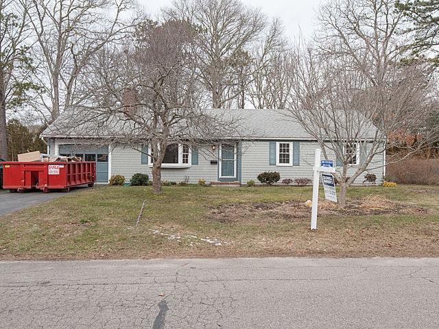 16 Tuckernuck Road Centerville, MA 02632 - Photo 19 of 26 a front view of a house with a yard