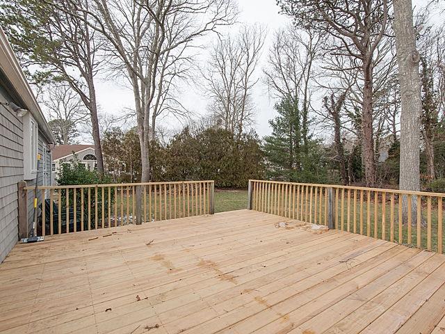 16 Tuckernuck Road Centerville, MA 02632 - Photo 20 of 26 a balcony with wooden floor and fence