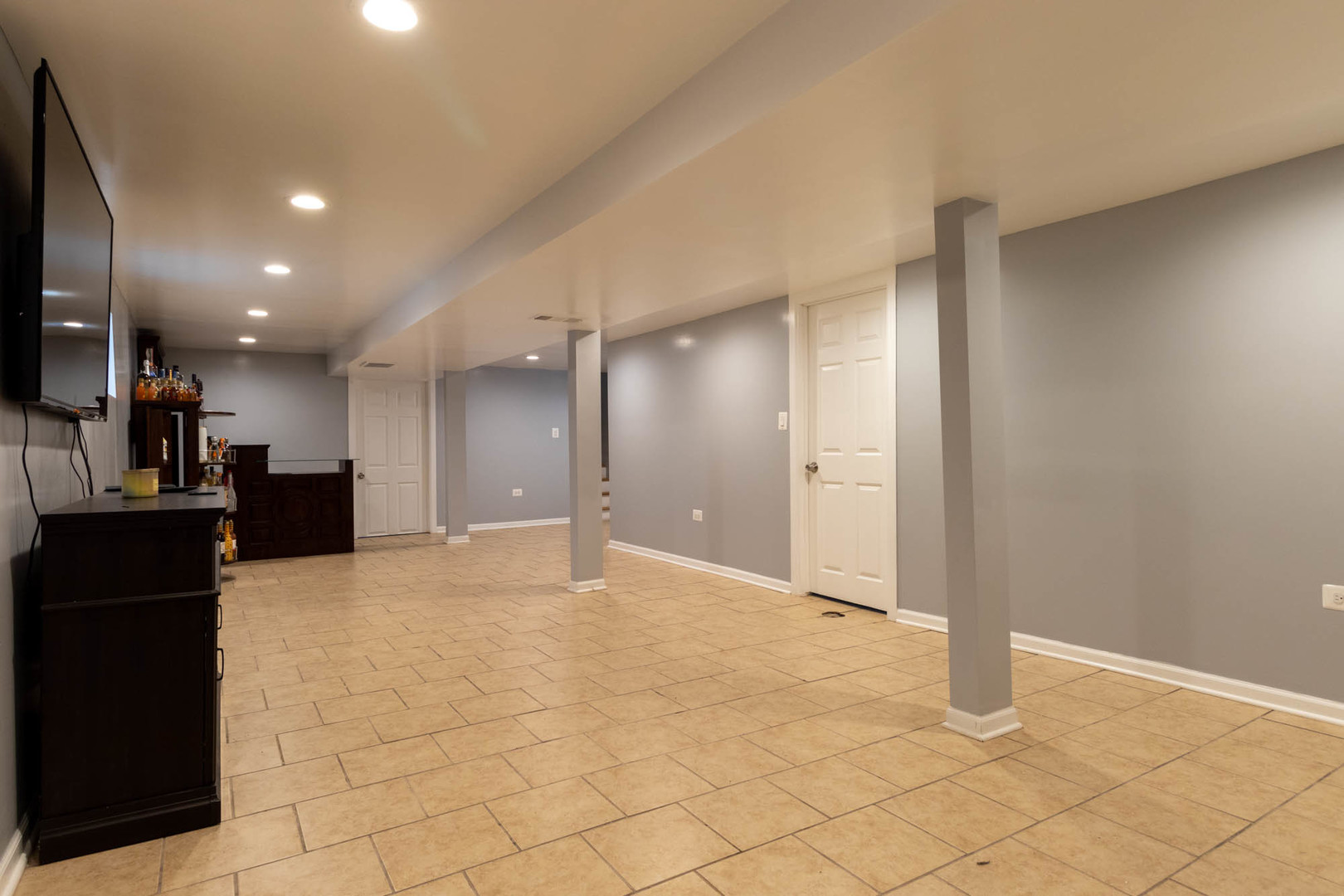 9951 South Perry Avenue Chicago, IL 60628 - Photo 23 of 27 a view of a big room with wooden floor