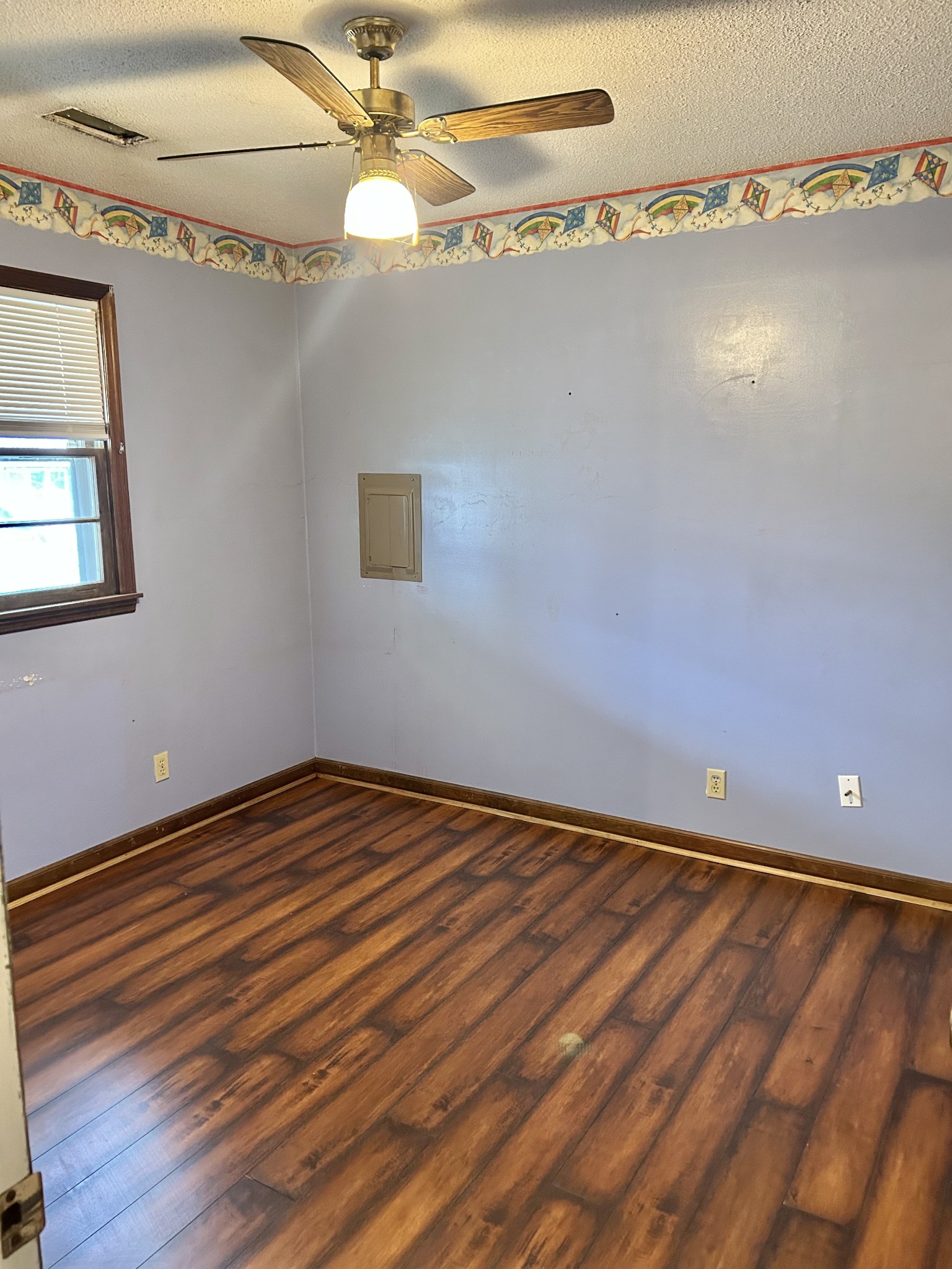401 Hillcrest Road Manchester, TN 37355 - Photo 33 of 39 a view of an empty room with wooden floor and a window