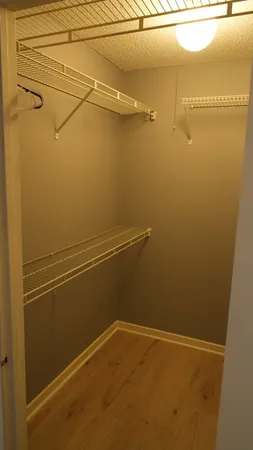 a view of a room with racks on the wall