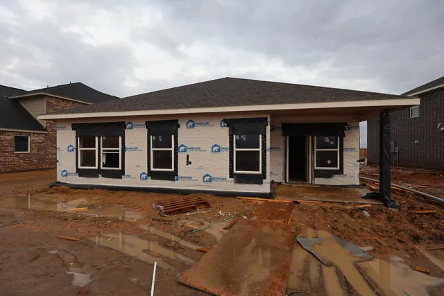 a view of a hallway with a door