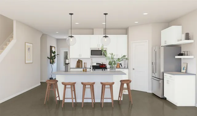 an empty room with windows and entrance