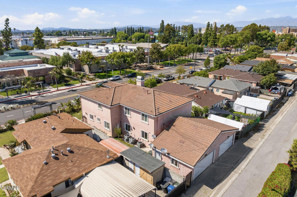 2546 Commerce Way Commerce, CA 90040 - Photo 52 of 53 an aerial view of a house with a garden and lake view