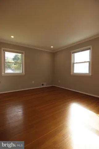 a bathroom with a toilet sink and shower