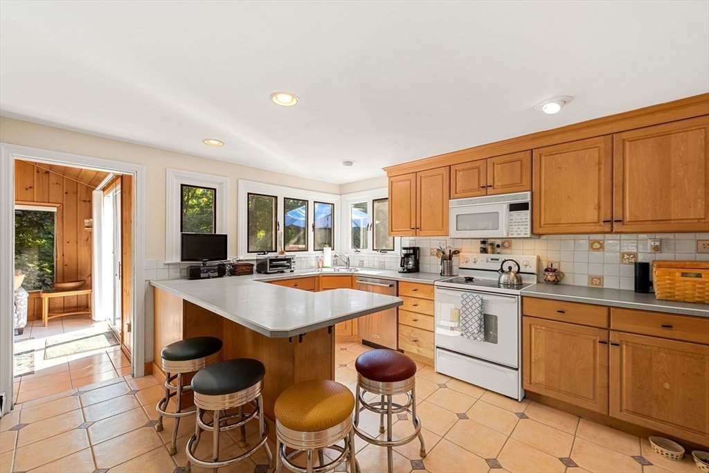 45 Wildwood Road Andover, MA 01810 - Photo 11 of 31 a kitchen with a sink and cabinets