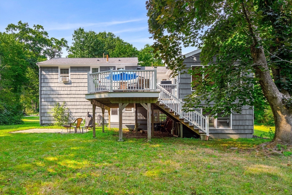 45 Wildwood Road Andover, MA 01810 - Photo 29 of 31 a view of a house with a backyard
