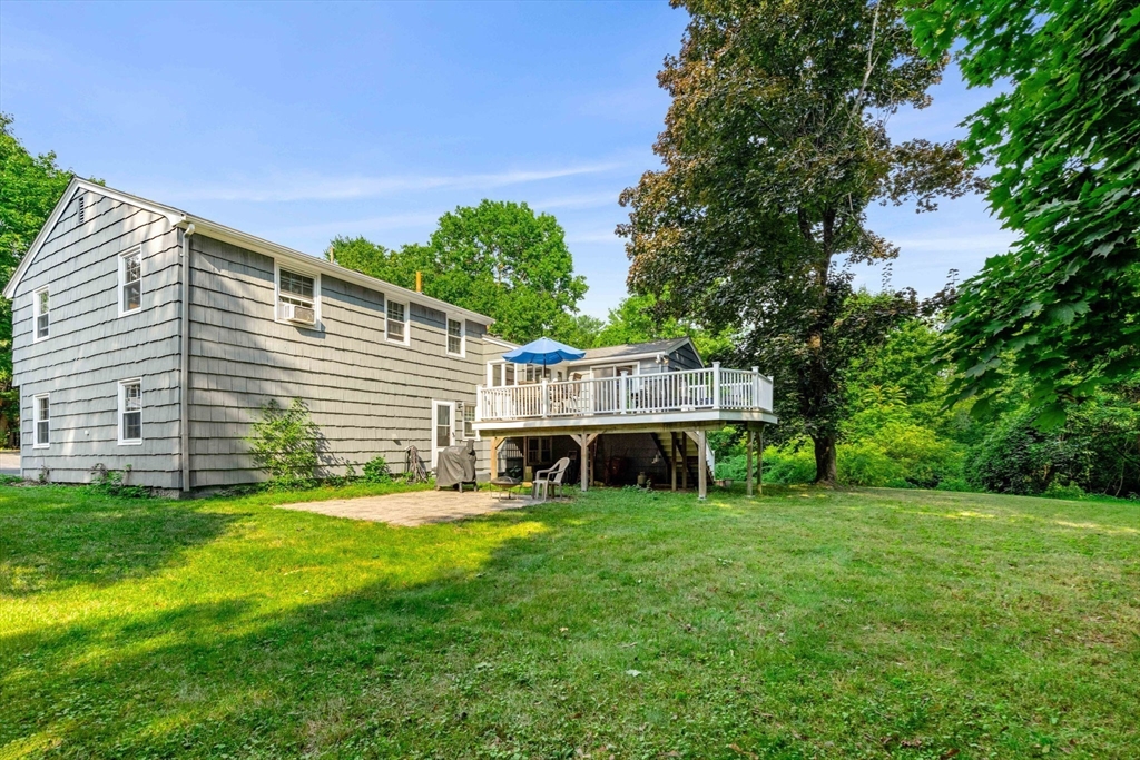 45 Wildwood Road Andover, MA 01810 - Photo 30 of 31 a view of an house with backyard and sitting area