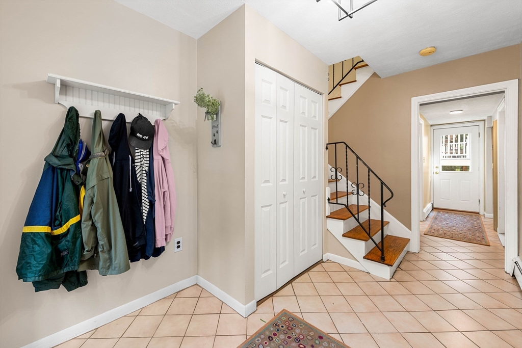 45 Wildwood Road Andover, MA 01810 - Photo 4 of 31 a view of walk in closet with clothes and shoes