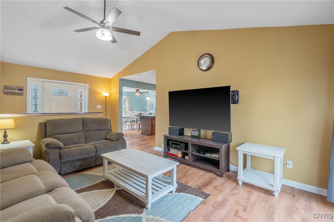 506 Richards Road Camillus, NY 13031 - Photo 16 of 37 Airy family room highlighted by vaulted ceilings