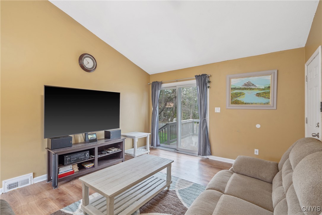 506 Richards Road Camillus, NY 13031 - Photo 17 of 37 Airy family room highlighted by vaulted ceilings