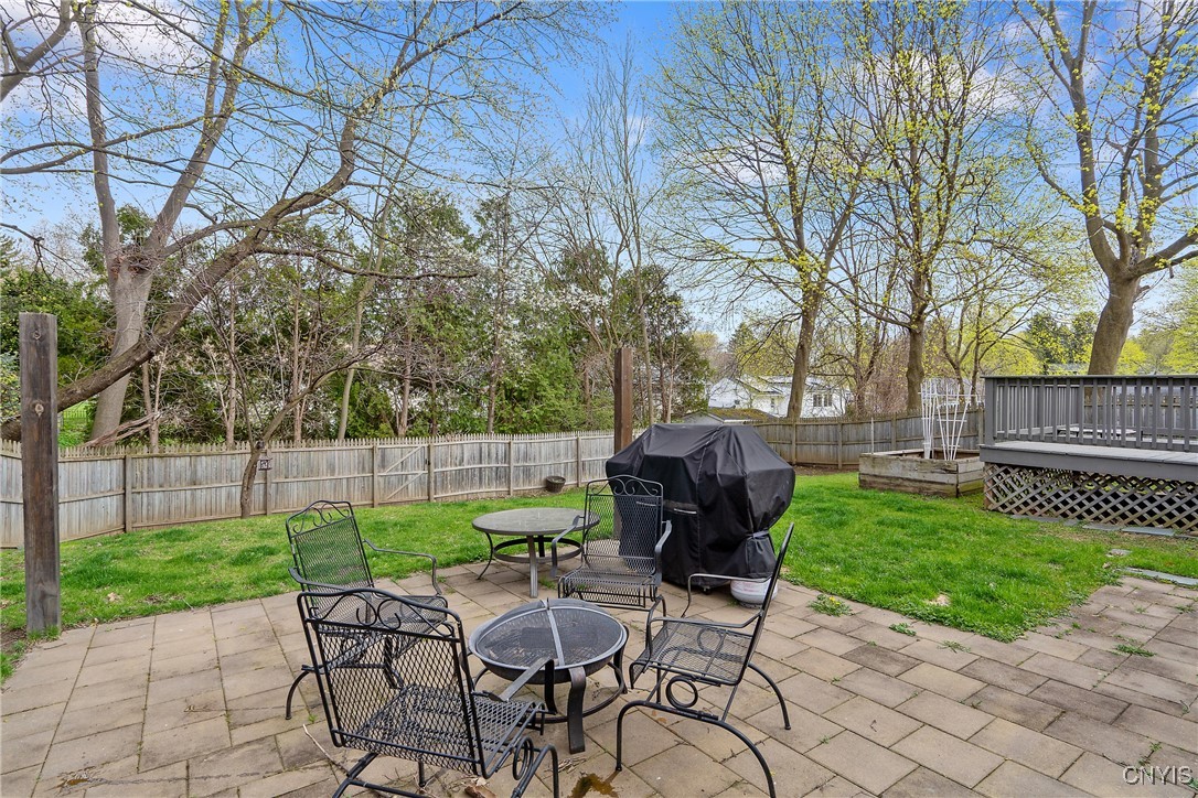 506 Richards Road Camillus, NY 13031 - Photo 33 of 37 Oversized backyard with a deck and patio—ideal for