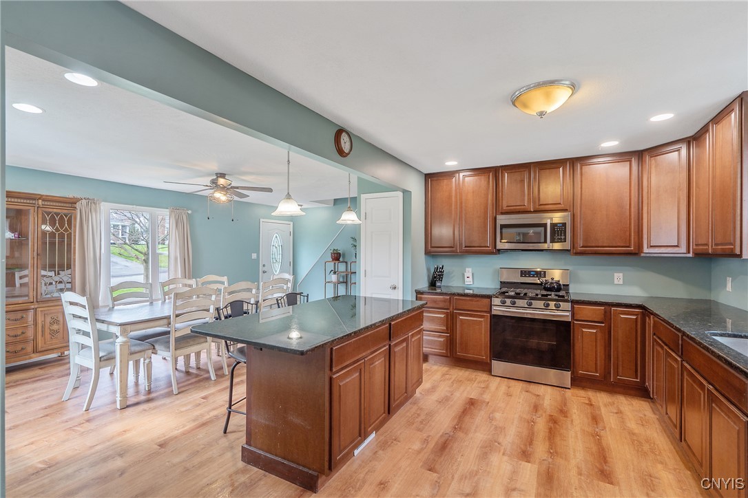 506 Richards Road Camillus, NY 13031 - Photo 9 of 37 Generous kitchen island with plenty of seating and