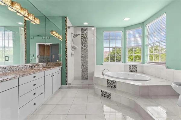 a outdoor living space with furniture and a fireplace