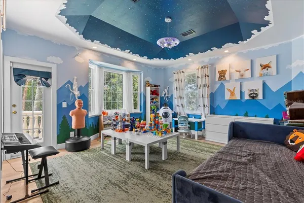 a view of a park with large trees