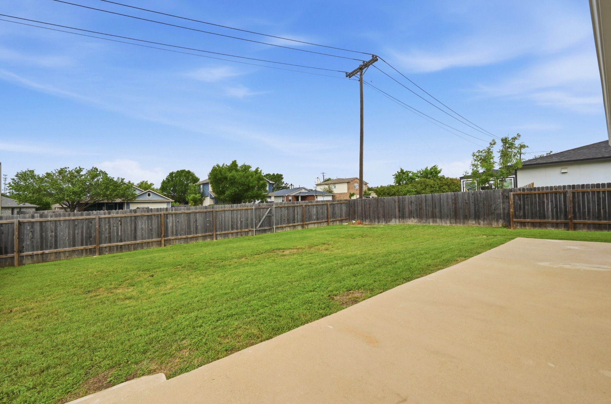 112 Mason Reed Cove Kyle, TX 78640 - Photo 23 of 26 a view of a back yard