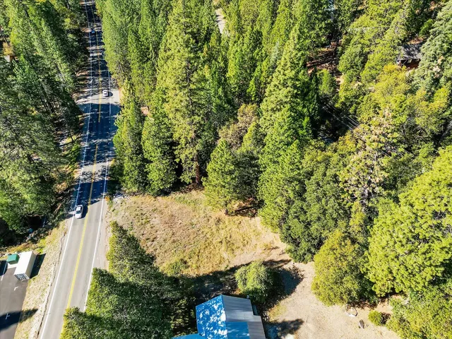 a view of a backyard of the house
