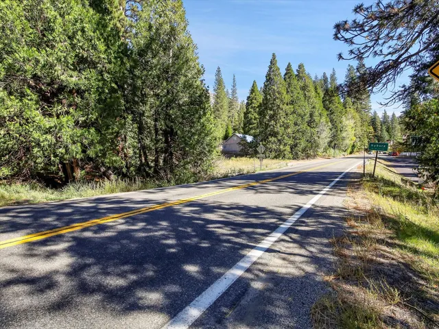 a view of a backyard of the house