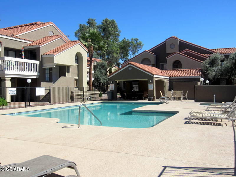 1905 East University Drive, Unit 131 Tempe, AZ 85288 - Photo 36 of 36 a front view of a house with a yard