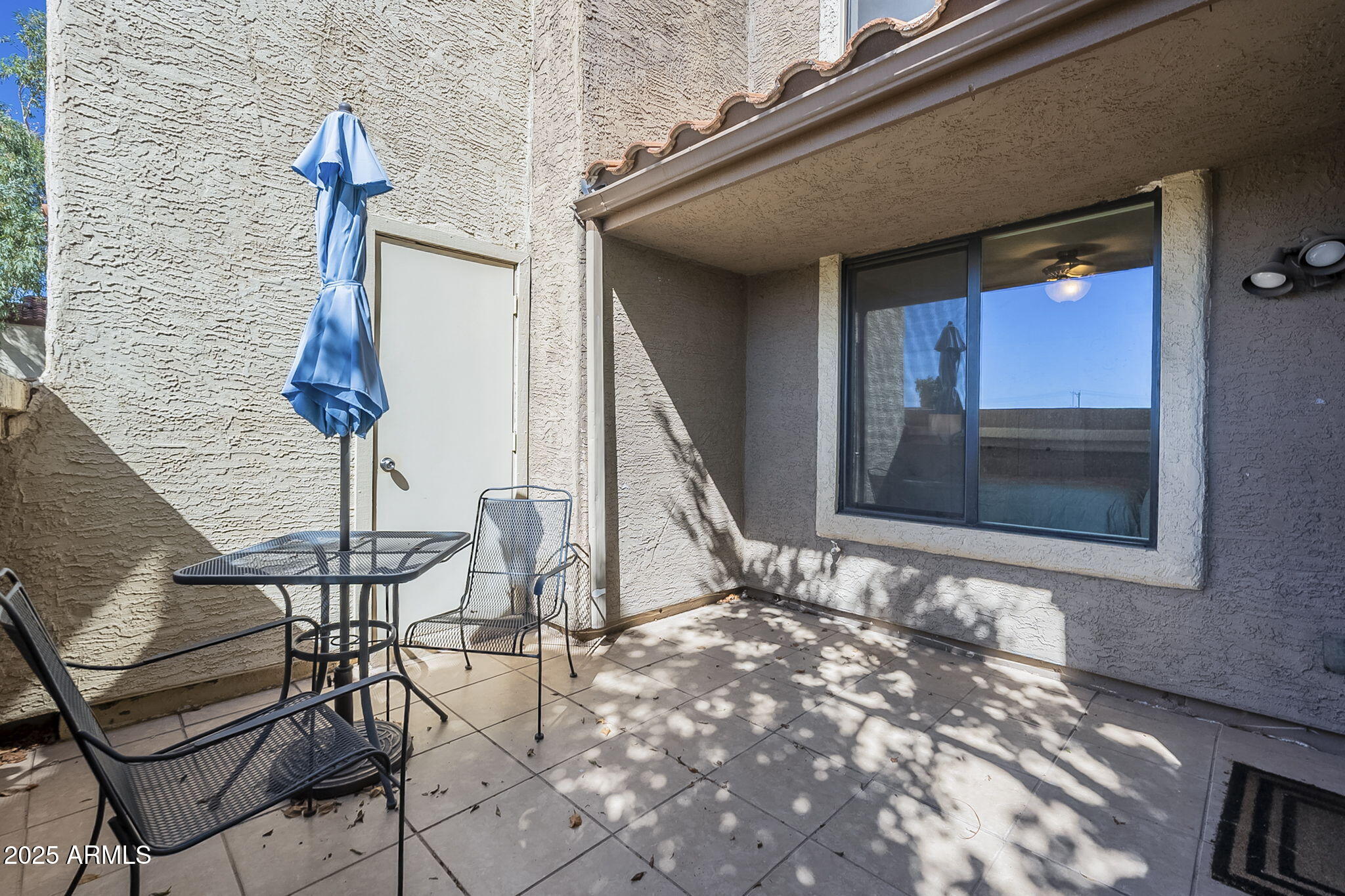 1905 East University Drive, Unit 131 Tempe, AZ 85288 - Photo 6 of 36 a front view of a house with entryway